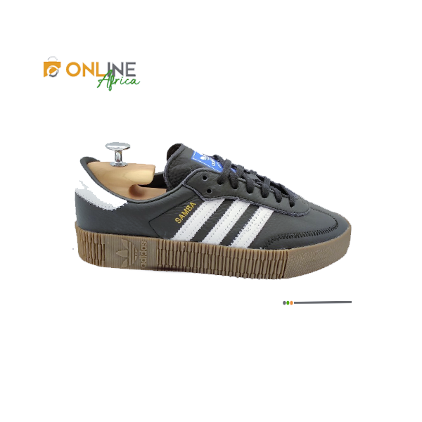 Chaussure Adidas Samba Platform noire avec bandes blanches et semelle épaisse en caoutchouc, style urbain et confort optimal.